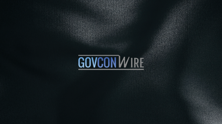 Black and white textured background with the GovCon Wire logo centered.